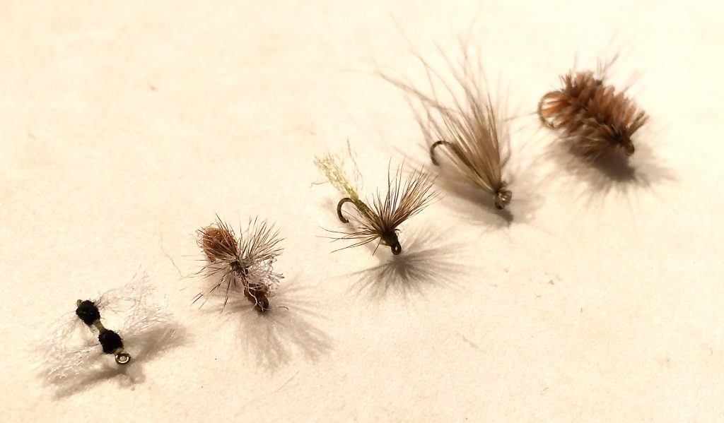 L to R: Two Wing Trico Spinner, Quigley's Glitter Ant Flag, Sparkle Dun, Weilenmann's CDC and Elk, Buzzball.